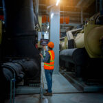 vecteezy_industry-engineer-under-checking-the-industry-cooling-tower_6668334